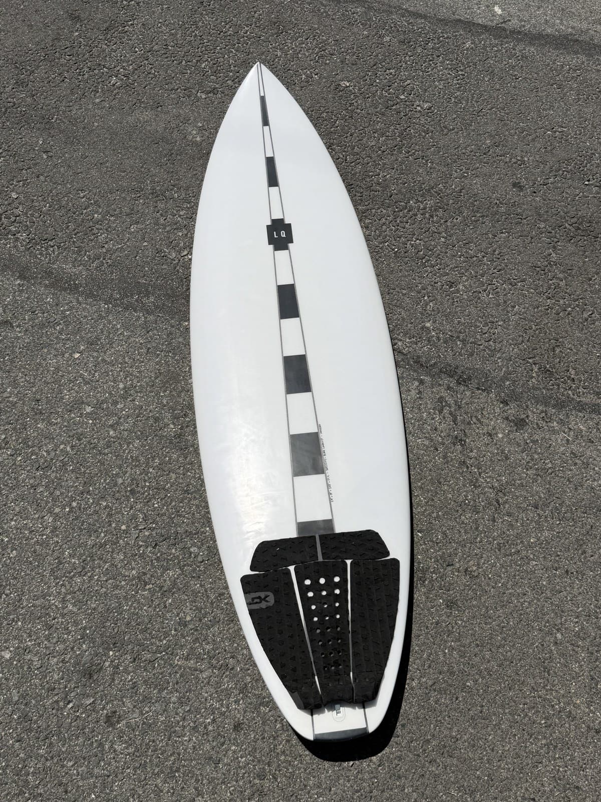5'9" Innuendo in the Lundquist Surfboards shop